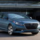 A blue Hyundai Sonata sedan